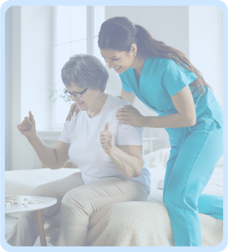 A caregiver sharing a joyful moment with a memory care resident