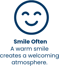 Smile Often — a warm smile creates a welcoming atmosphere
